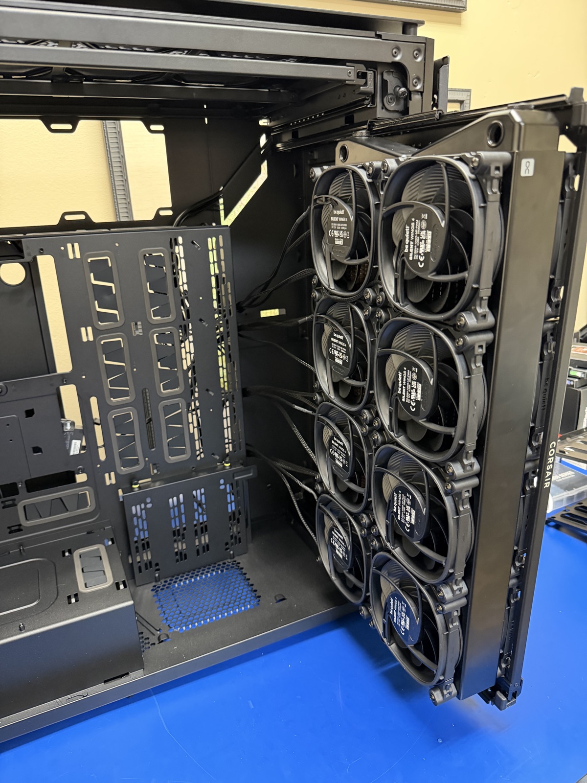 The 9000D's radiator bracket swung out — eight fans going onto one rad, outside the case
